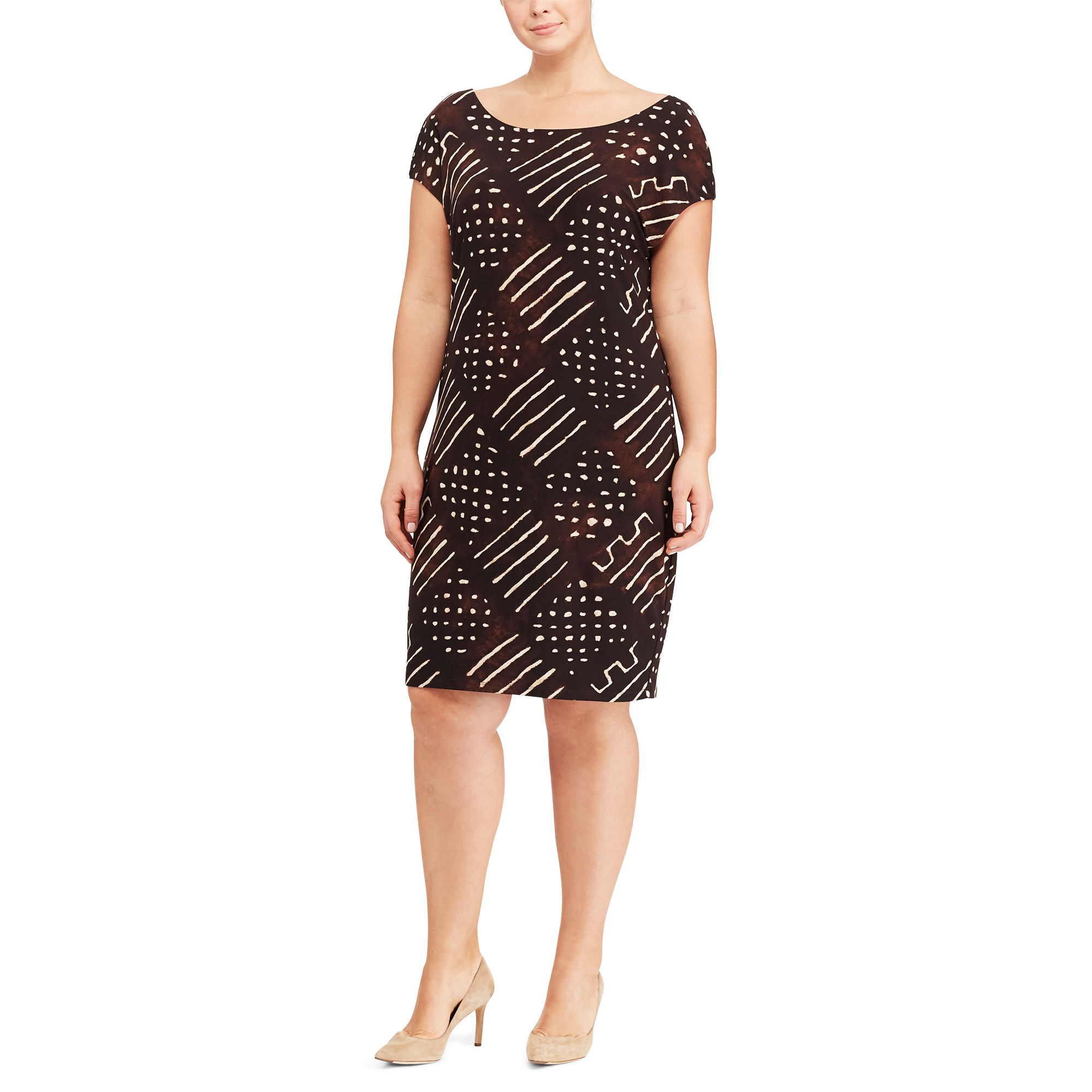 Title: The Stylish and Timeless Look of a Black Tie Dress with Geometric Patterns