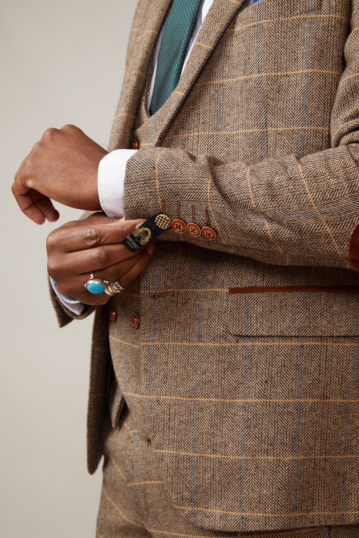 Title: The Stylish and dashing male figure in a suit and tie