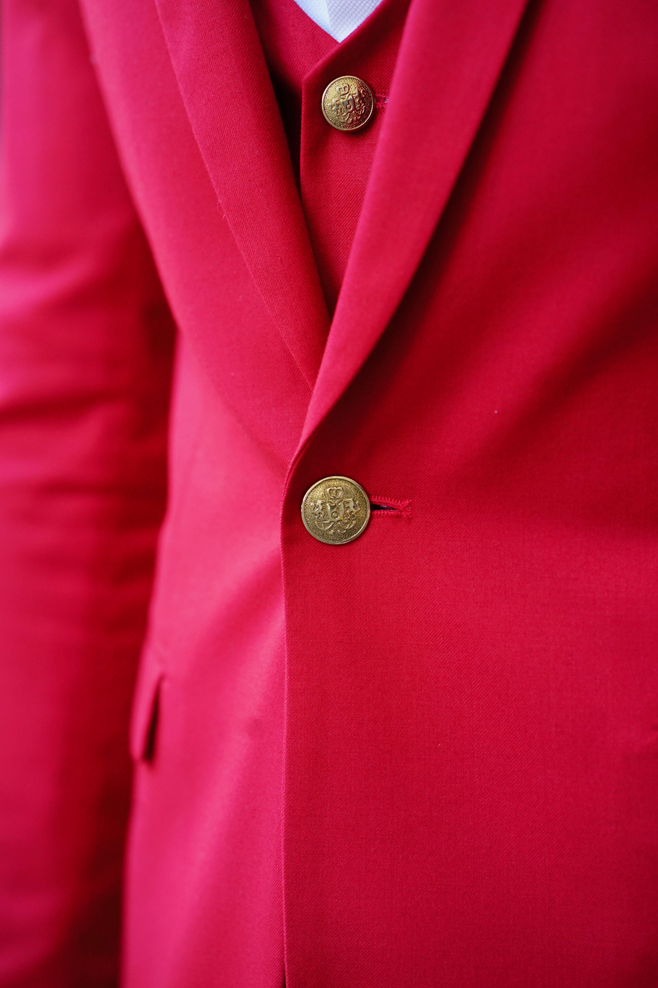 Red Tie Customized in a Suit: A Fashion Statement