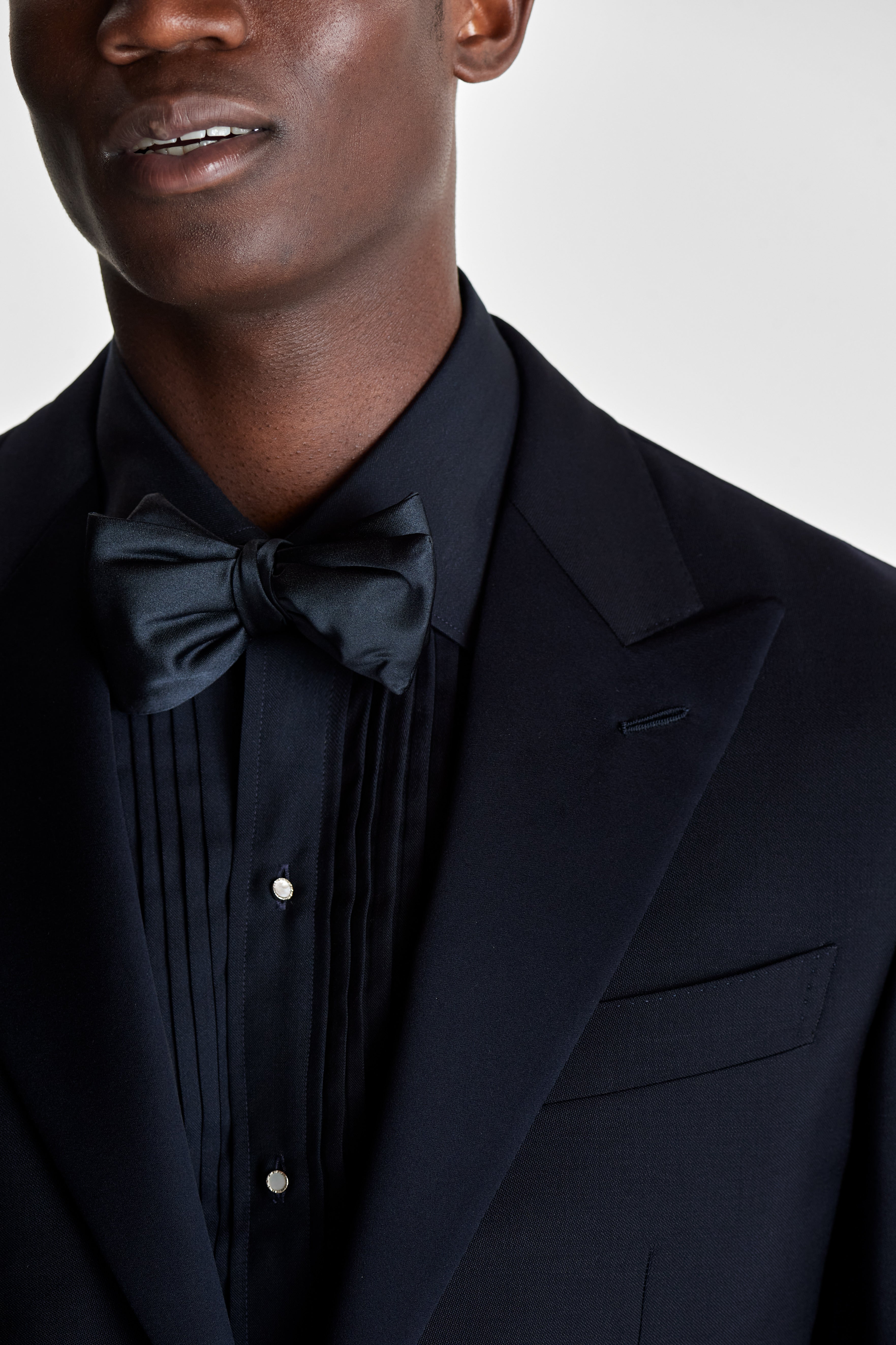 The Art of Combining a Dark Blue Tie with a Tall Tie Clip: A Guide to Dressing for Success