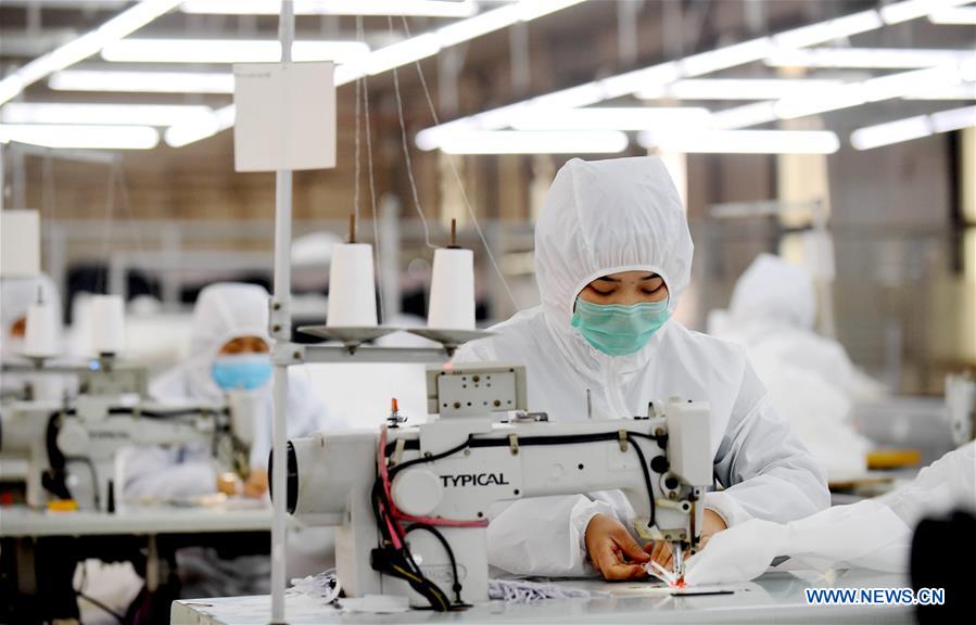 Title: Exploring the Essence of Shengzhou Xinwang Tie服饰 Factory: A Journey Through phone and Quality Production