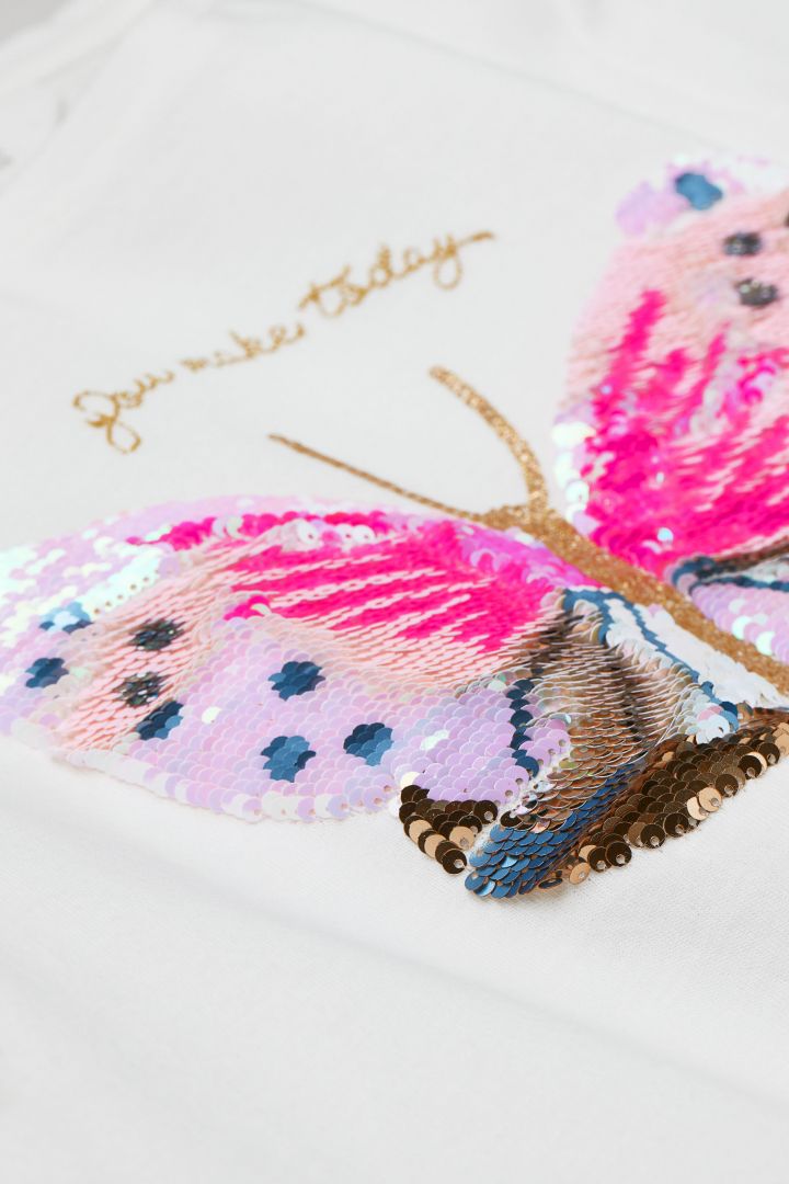 The Clothing Brand with the Butterfly Knot: A Tale of Fashion and Entrepreneurship