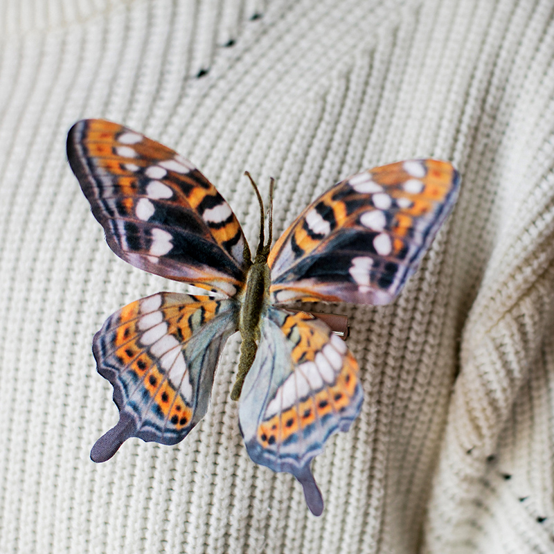 The Brand with a Butterfly on its Tie