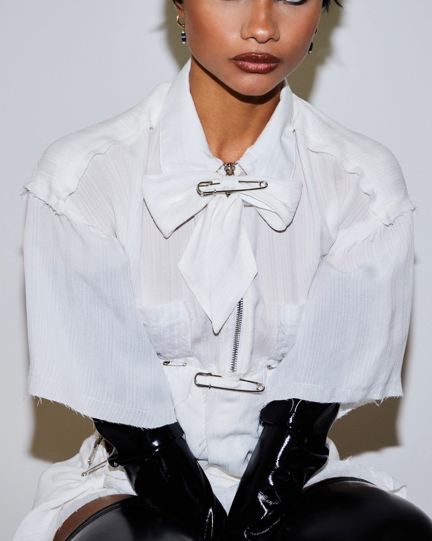 Title: The Timeless Style: White Shirt, Black Tie, and Ribbon Combination