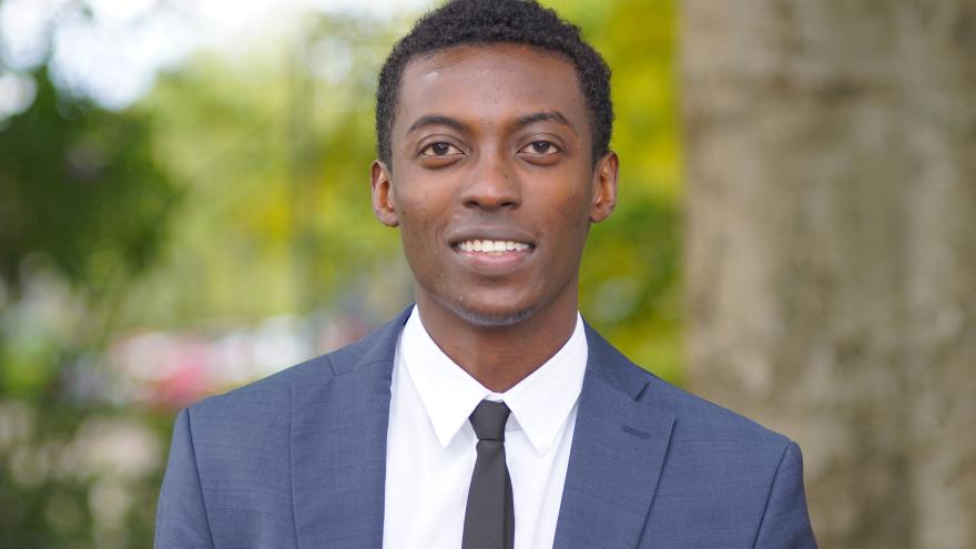 Title: A Stunning Portrait of a Handsome Young Man in a Suit and Tie