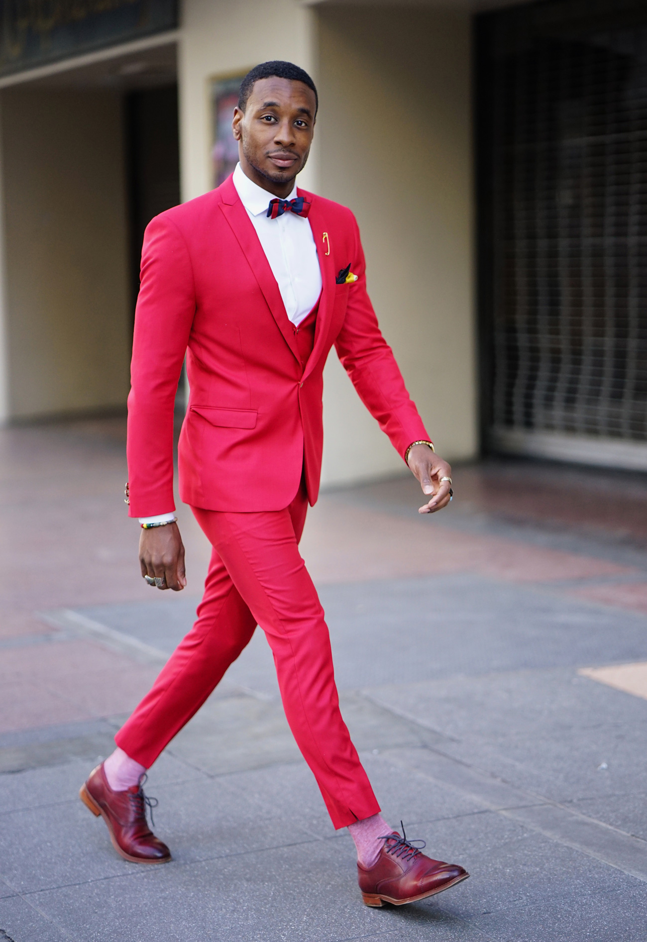 Title: Red Ties on Suit Necks: A Significance and Evolution in Formal Wear