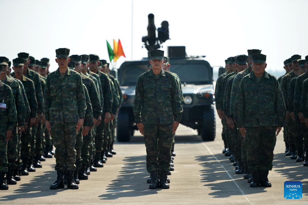 Title: A Collection of Videos Showing Young Men donning Military Uniforms and Tying Ties