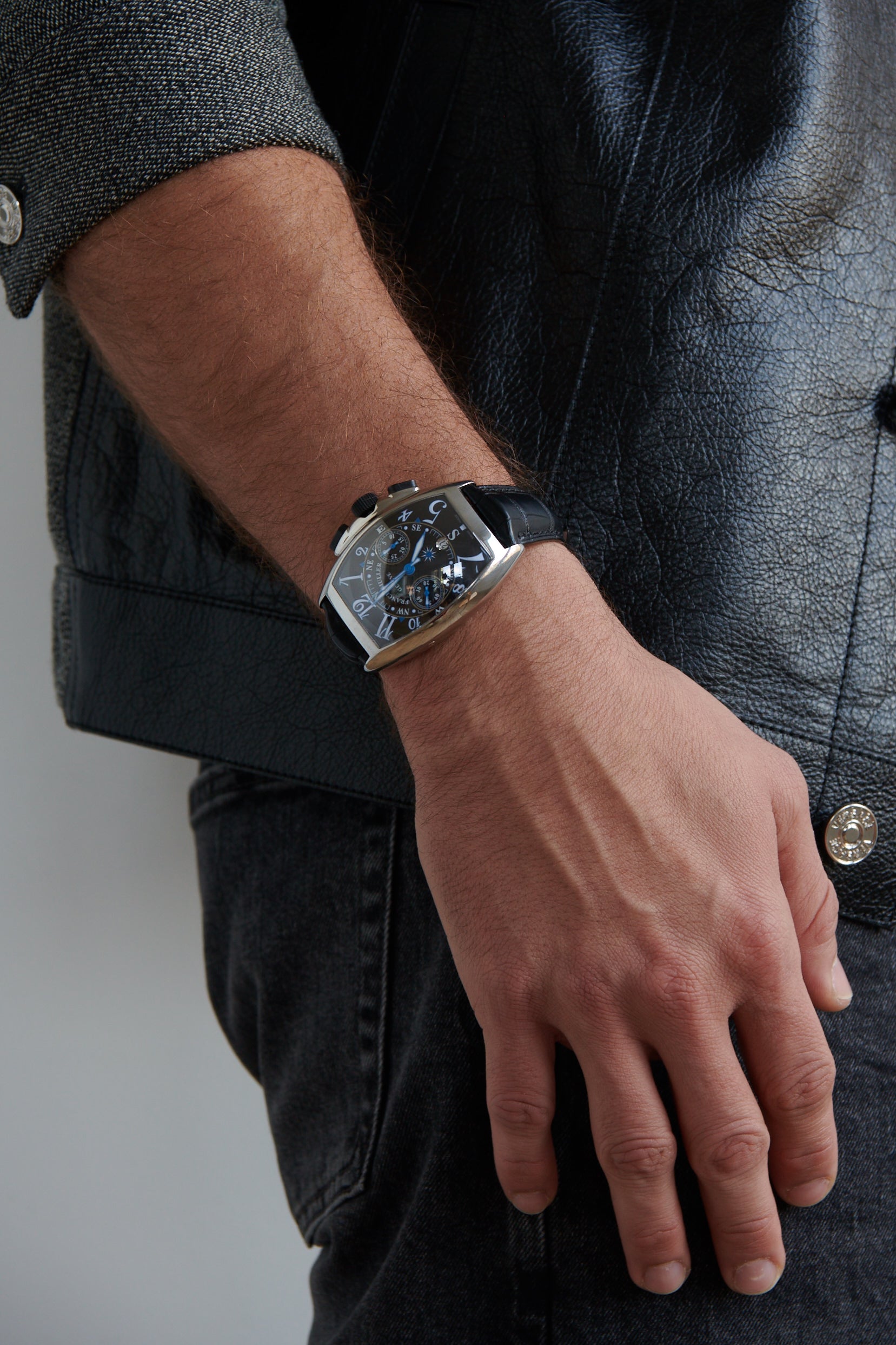 Title: The Timeless Elegance of a Watch Encased in a Tie Clip