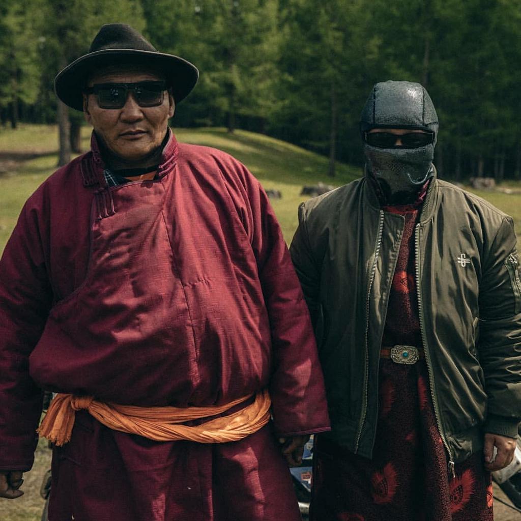 Title: Mastering the Art of Tying a Mongolian Black Suit and Tie: A Comprehensive Guide