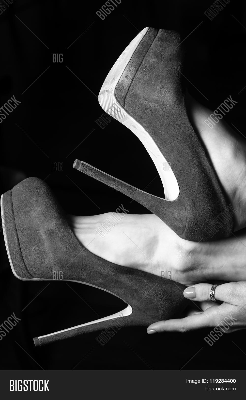 Title: The Enigmatic Allure of Ties, High Heels, and the World of Fiction