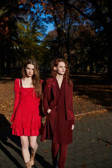 Title: The Stylish Fusion: Korean Suits Paired with Red Ties - A Visual Journey