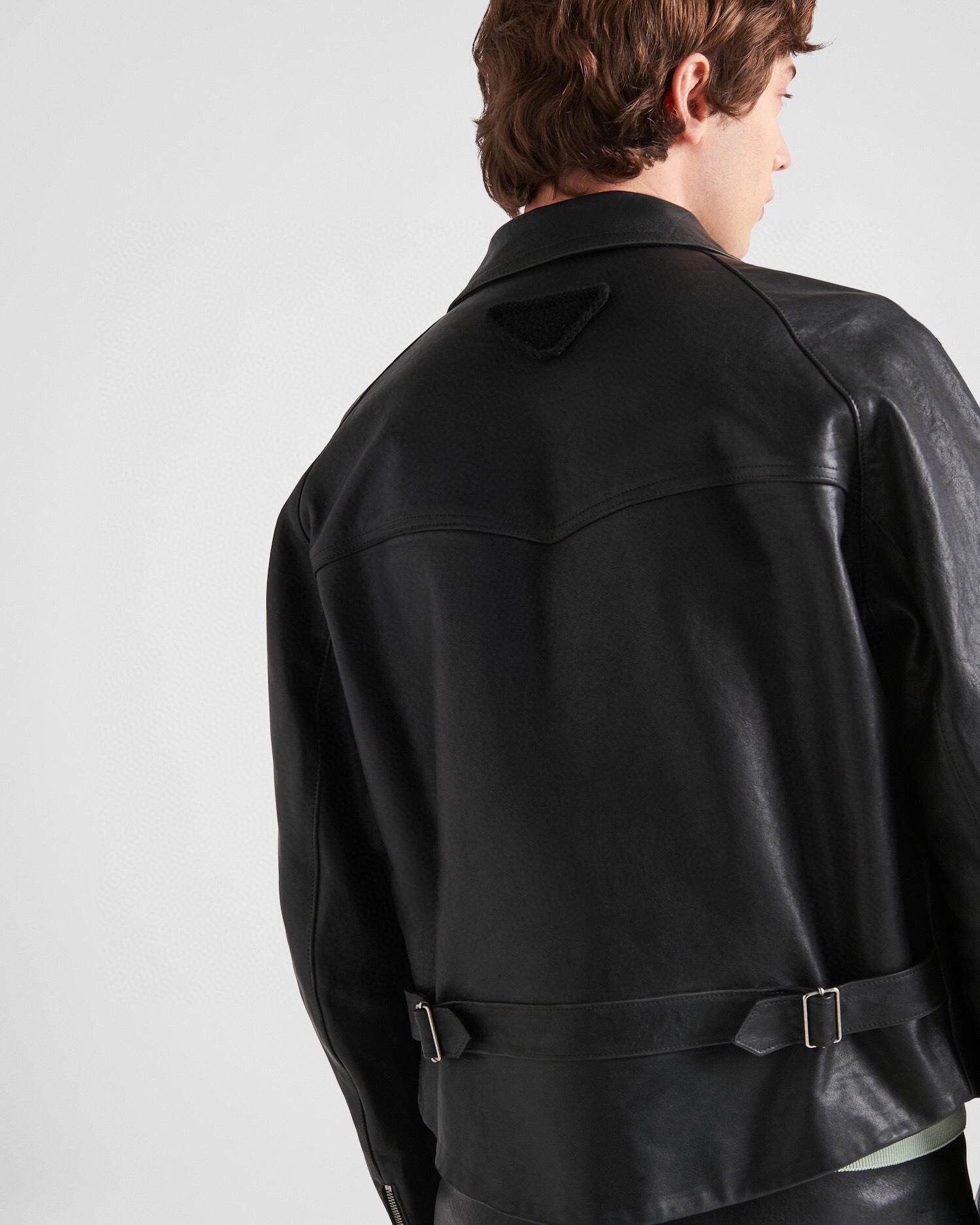 The Long-Tied Leather Jacket: Fashion Statement or Functional Design?