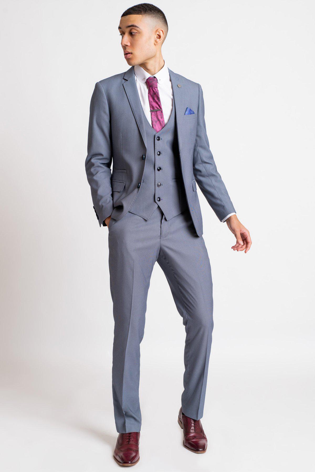 Do You Prefer Blue Suits with Grey Ties? The Art of Dressing for Success