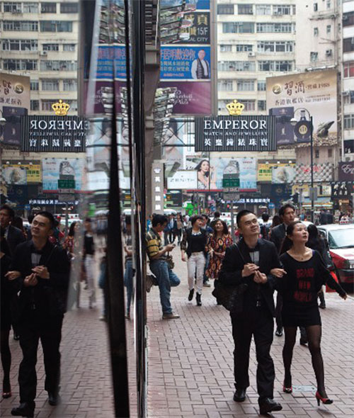 Title: From Ties to Blockbusters: The Pivotal Role of Mens Fashion in Hong Kong Cinema