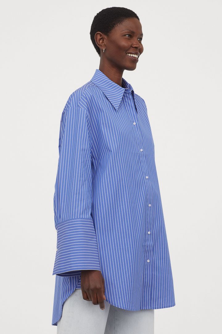 Title: Unveiling the Elegance: The Allure of a Blue Striped Shirt