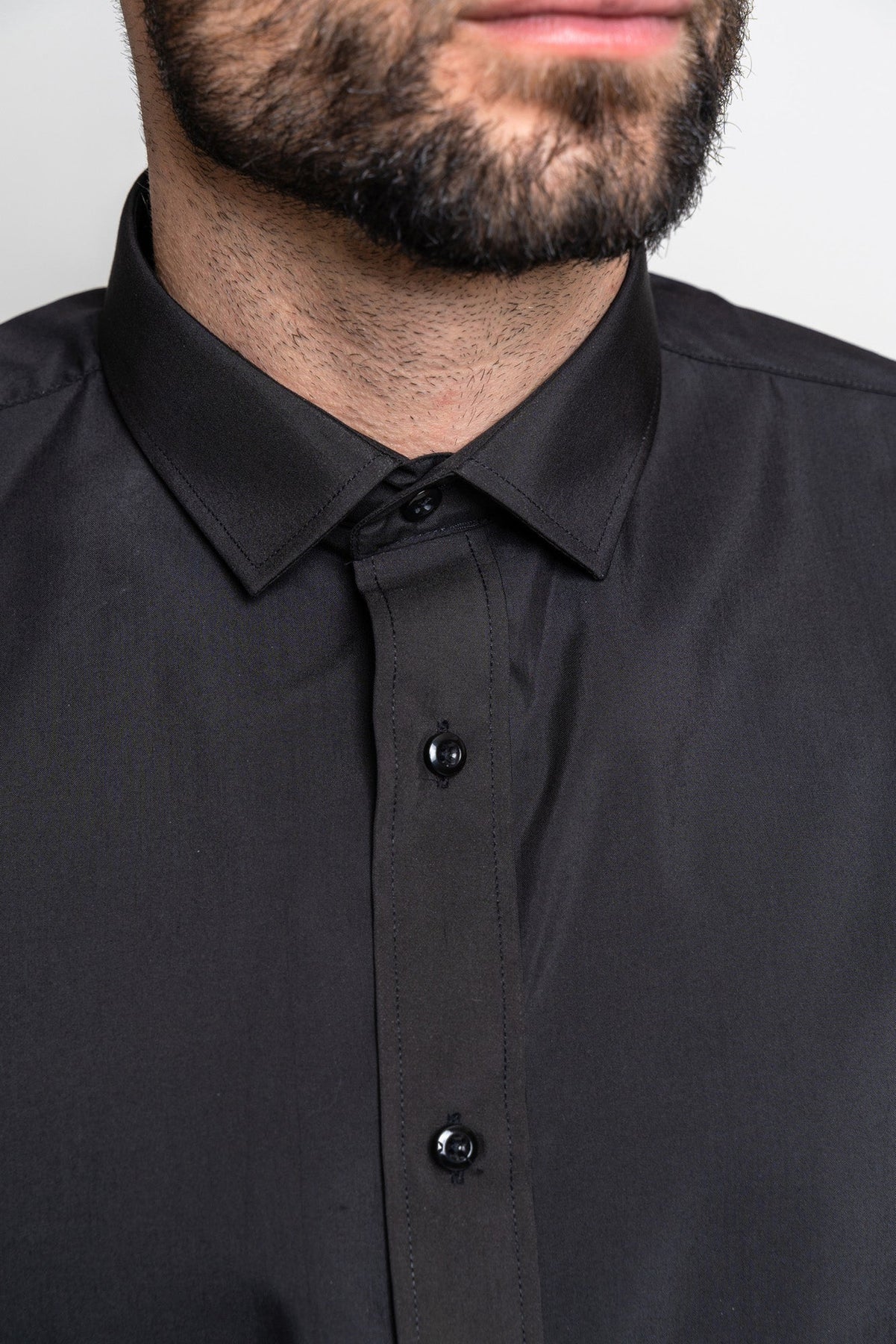 Title: The Classy Charm of a Black Shirt with a Tie