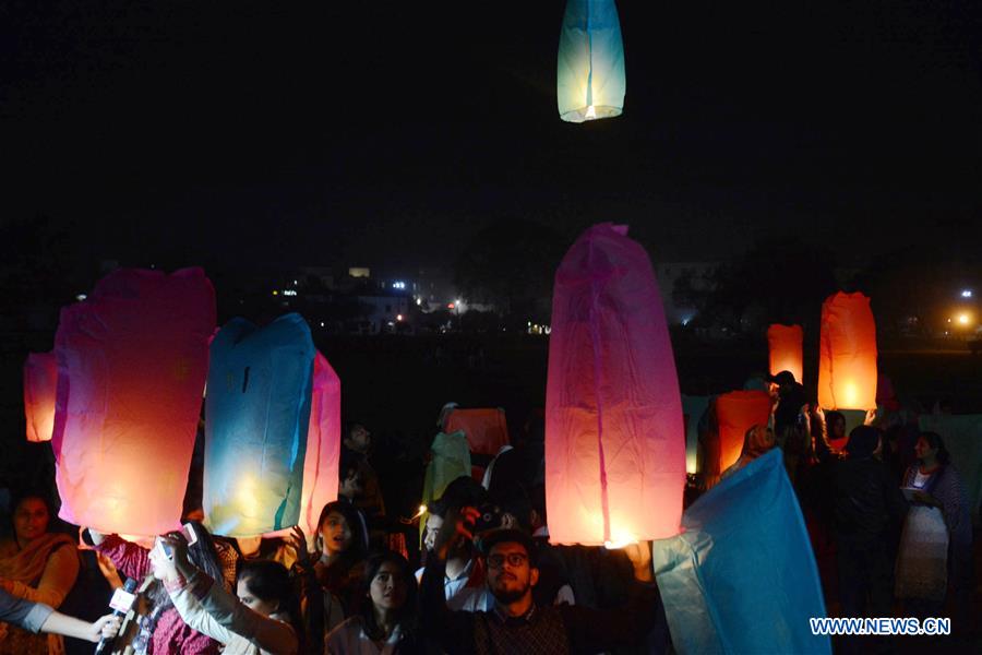 Title: Adapting Traditions: The Art of Hanging Lanterns and Ties