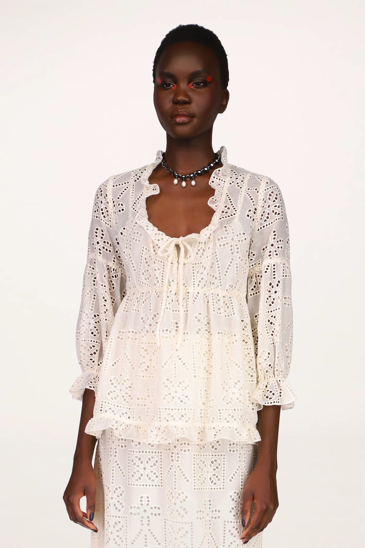 Title: Embroidered Ruffle Sleeves: A Fashionable Twist on a Timeless Classic