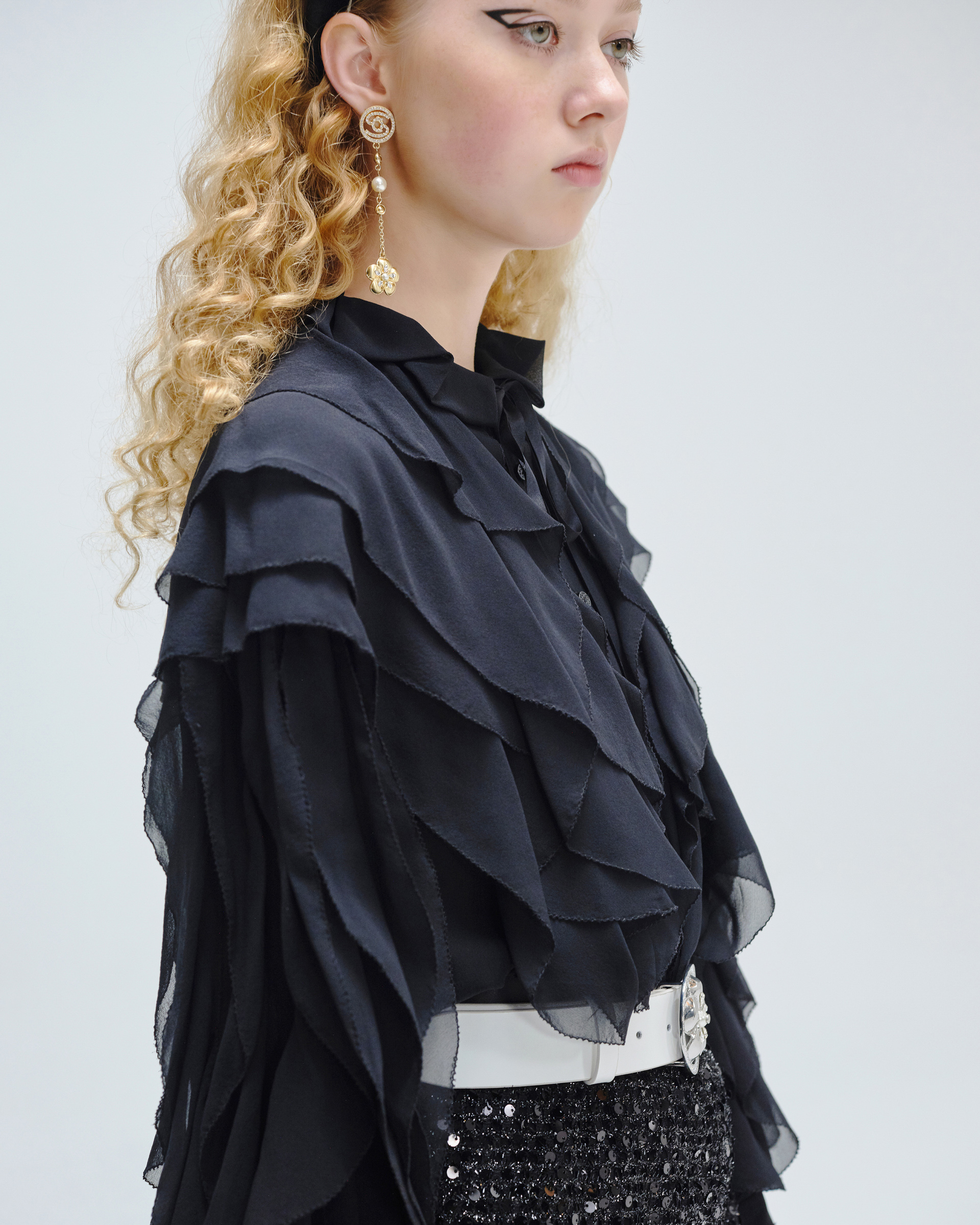 Title: Embroidered Ruffle Sleeves: A Fashionable Twist on a Timeless Classic