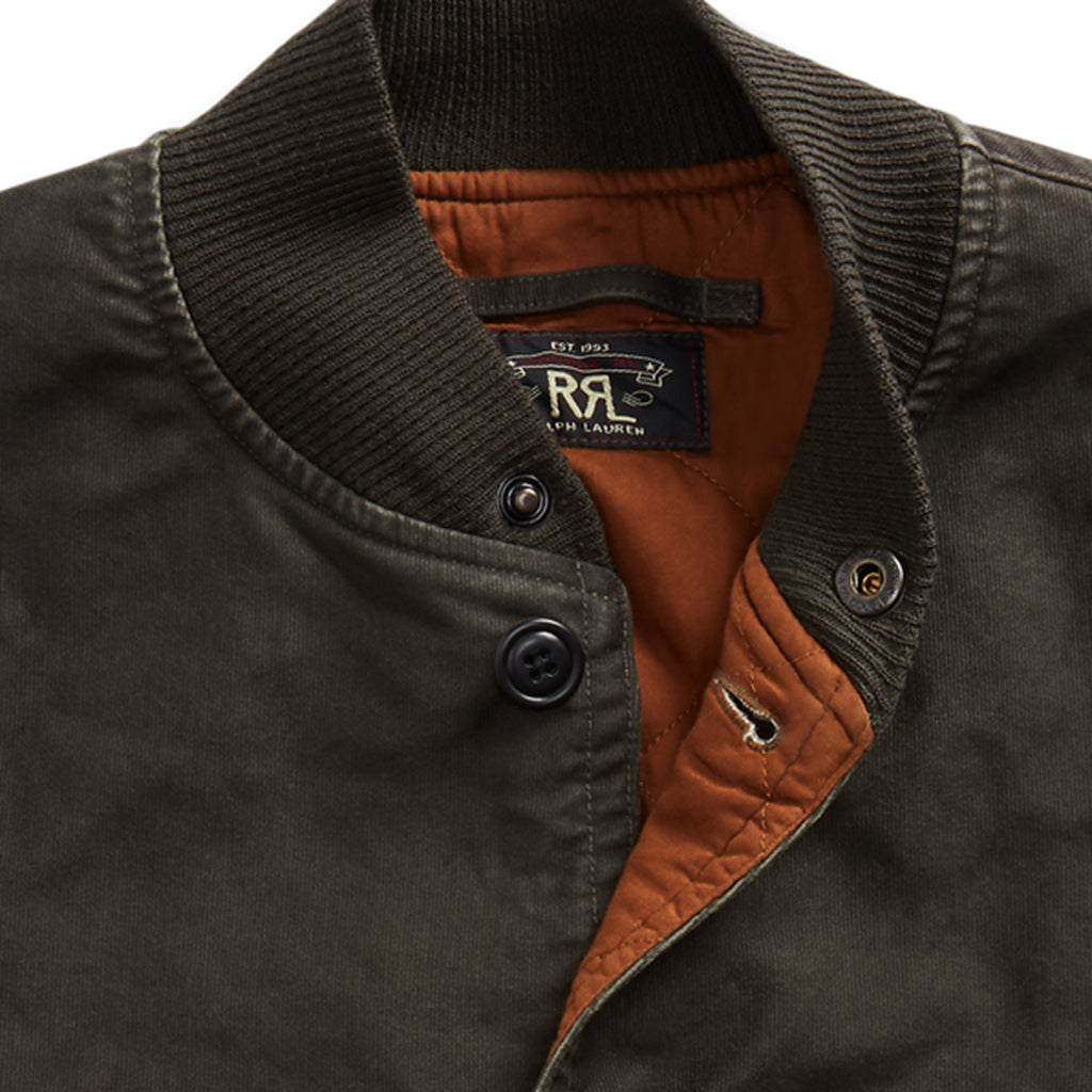 Title: The Brand with the R-Letter Tie in its Down Jacket