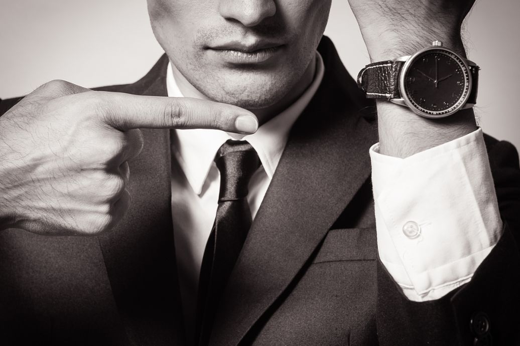 The Rhythmic Charm of a Suit-Clad Drummer in a Tie