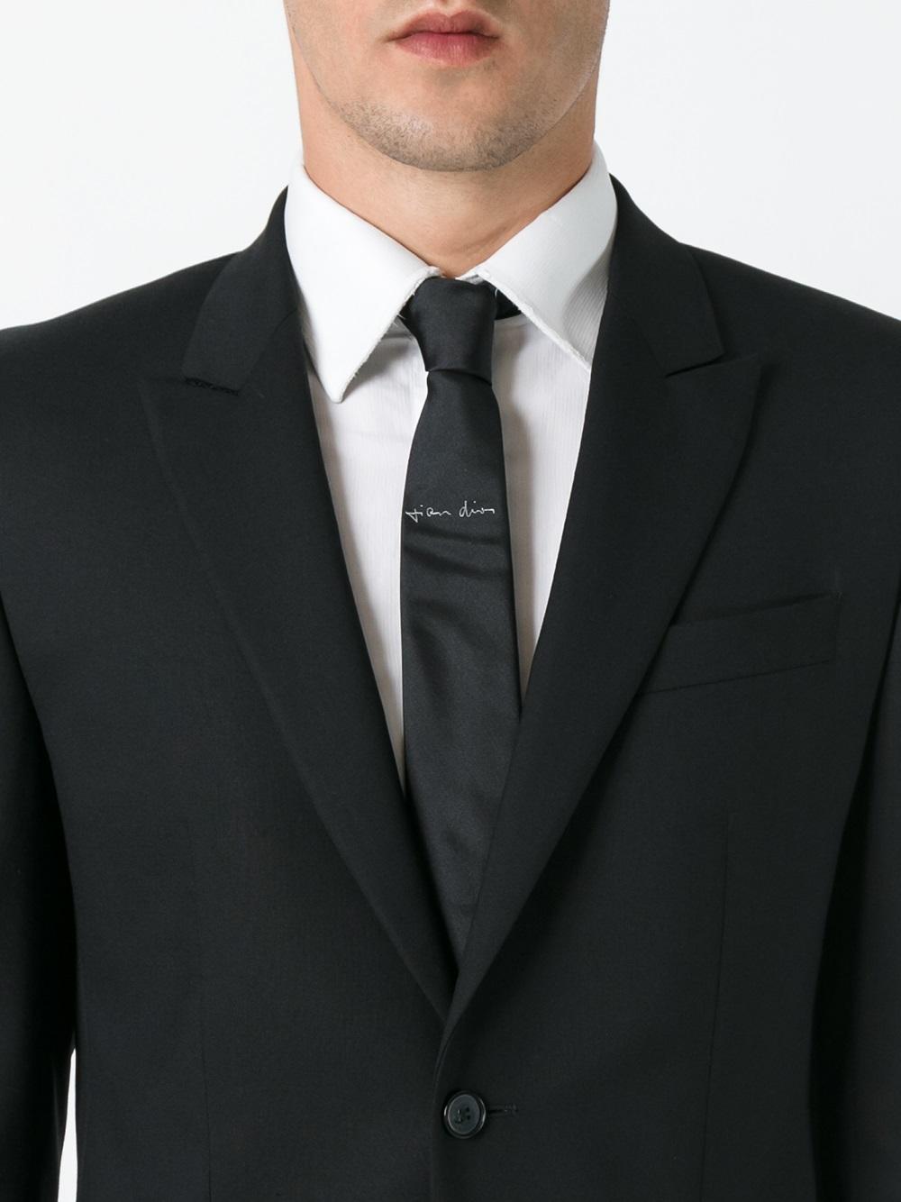 Embracing Excellence: The Significance of Genuine Suit Ties