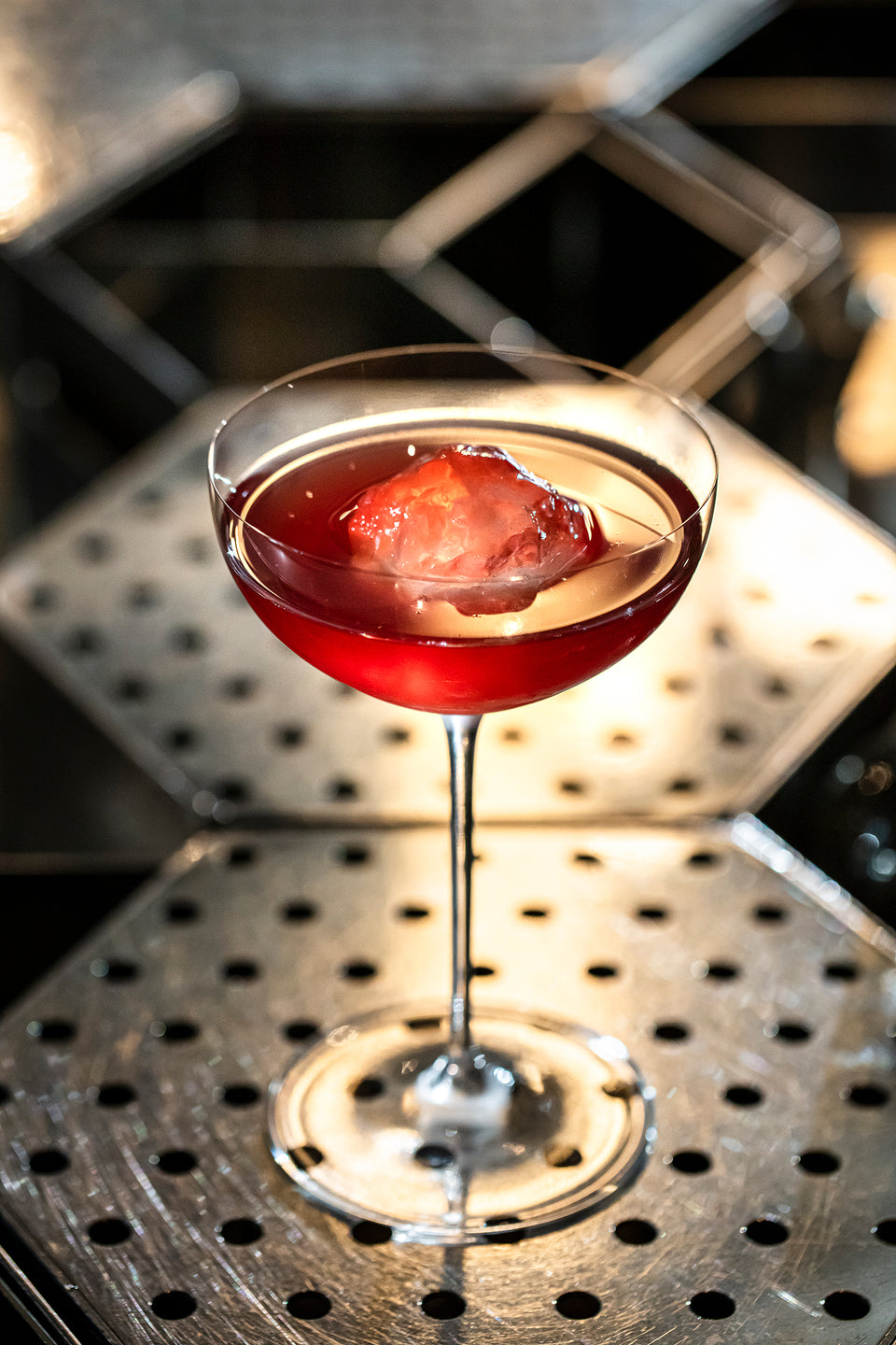 The Enchanting Charm of a Smile with a Bow Tie and a Glass of Wine