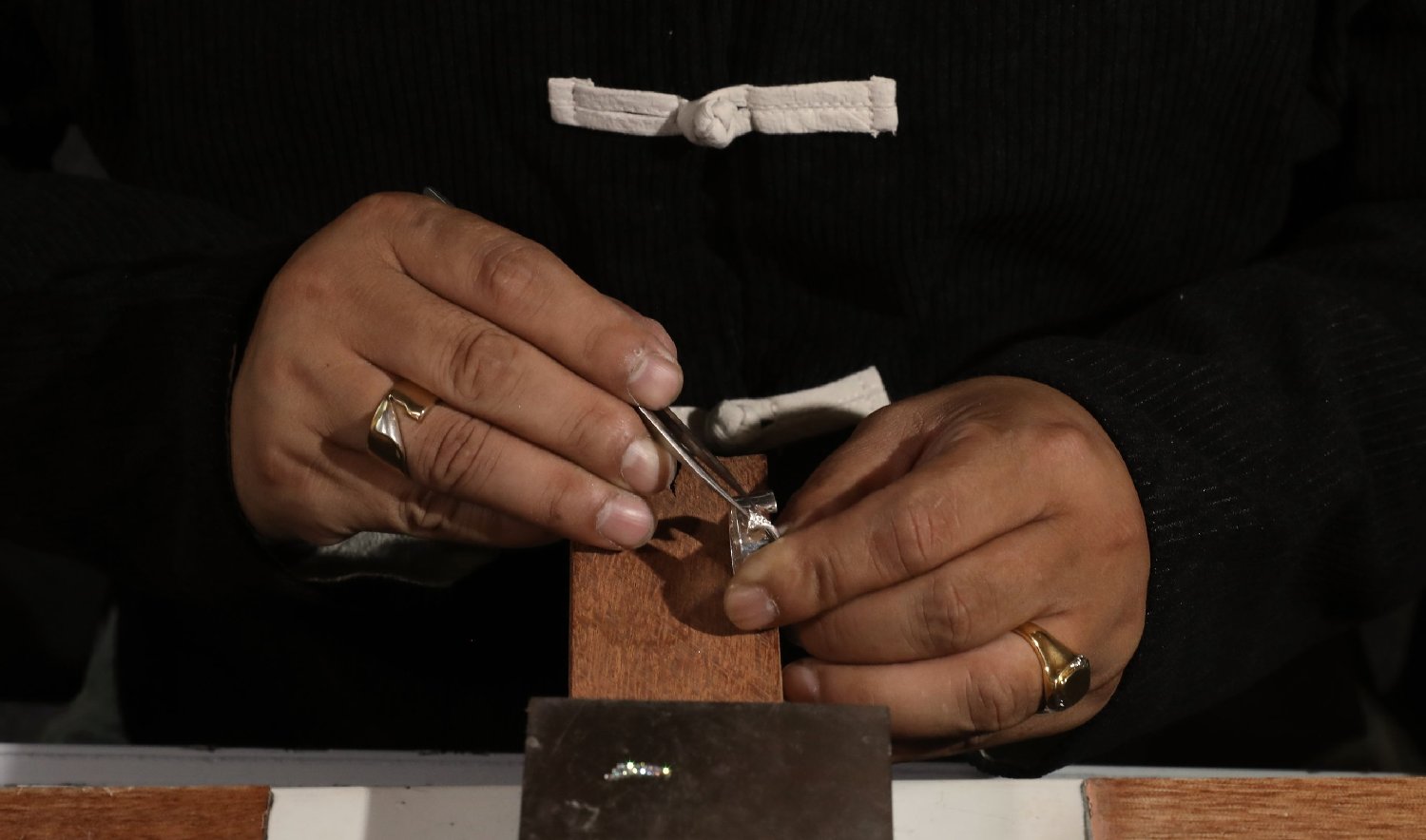 Crafting a Timeless Accessory: The Art of Making Hand-Sewn Tie Clips and Pendants