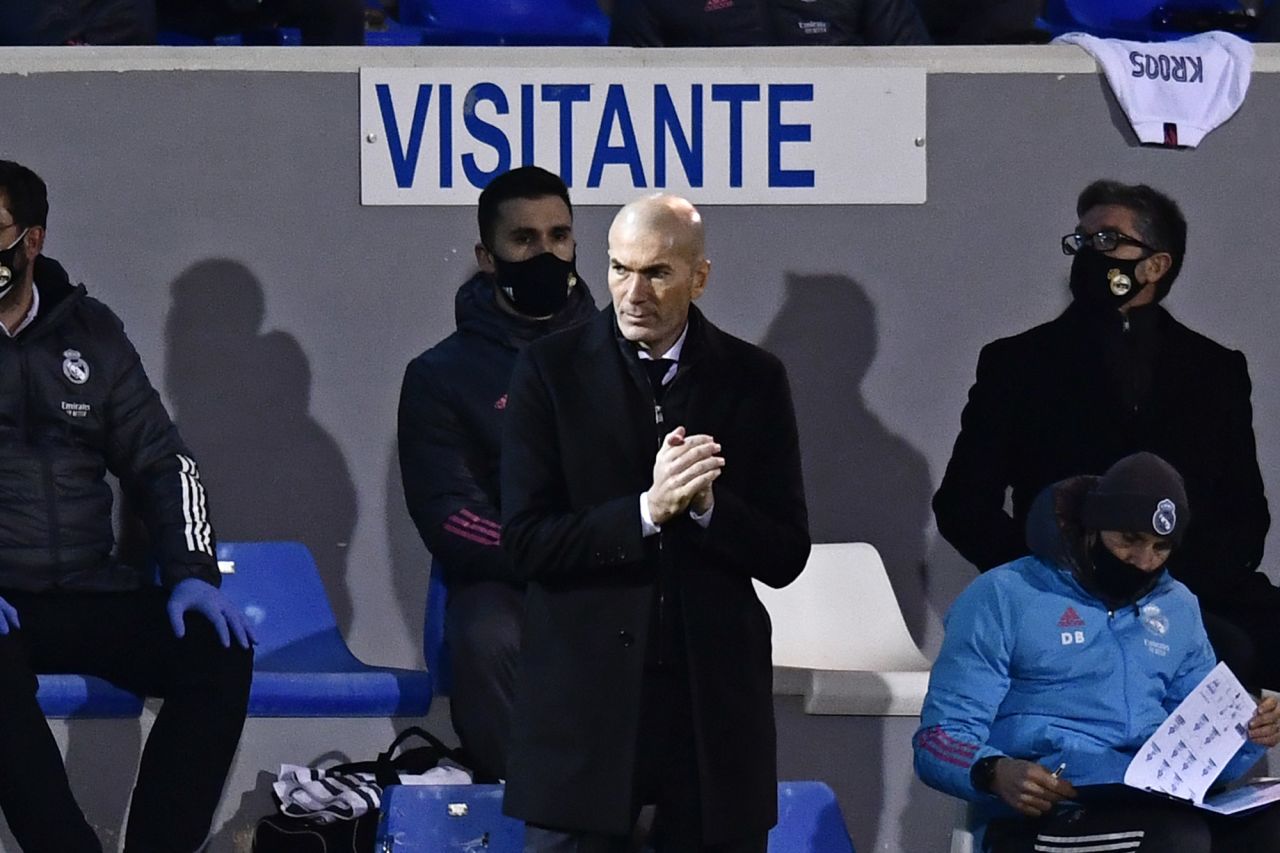 Zinedine Zidane: A Mastermind of Footballing Brilliance, Wrapped in a Tie