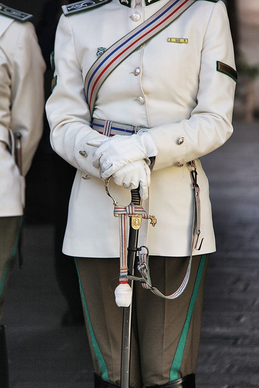 The Majestic allure of a Tie and Military Uniform