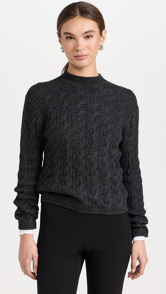 The Unique Charm of a Tied-up Sweater