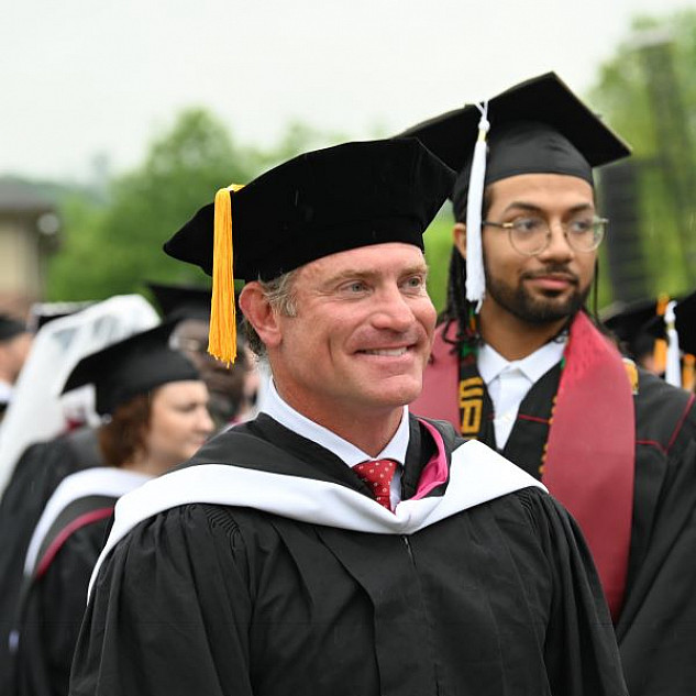 The significance of the graduation photo tie man