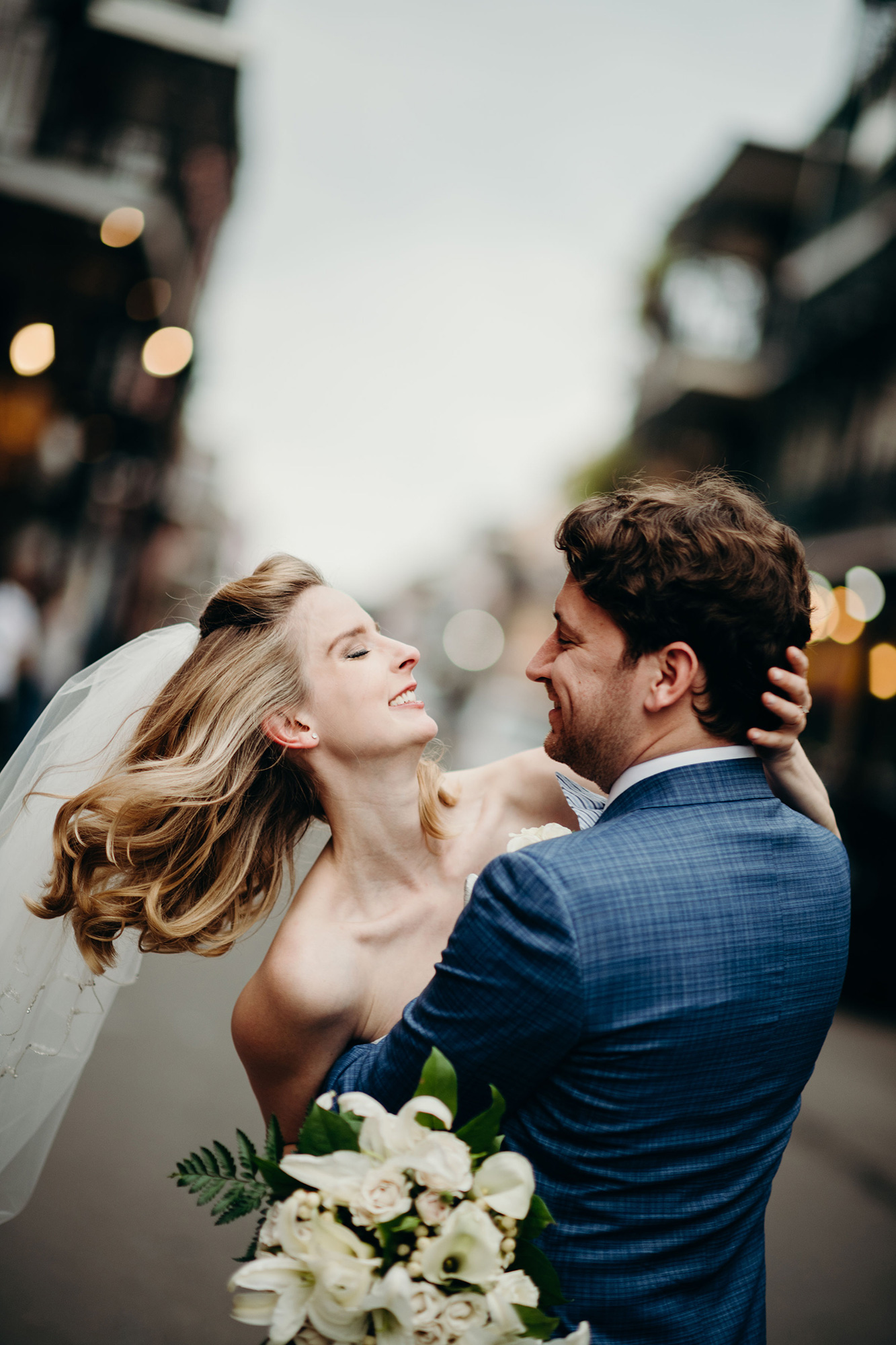 The Romantic Gesture of Untying a Tie in a Couples Photo